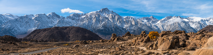 Sierra Nevada Mountains covered by snow and clouds, California, USA.