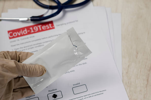 istock Laboratory scientist performs a rapid diagnostic test (rdt) for antibodies to detect the presence of viral proteins. caused by coronavirus disease COVID-19, PCR laboratory test. Inputs for testing 1224939958