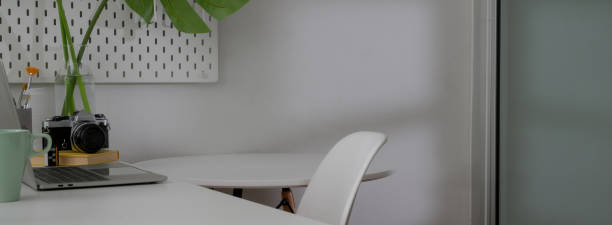 istock Cropped shot of minimal home office interior design with white worktable 1224942909