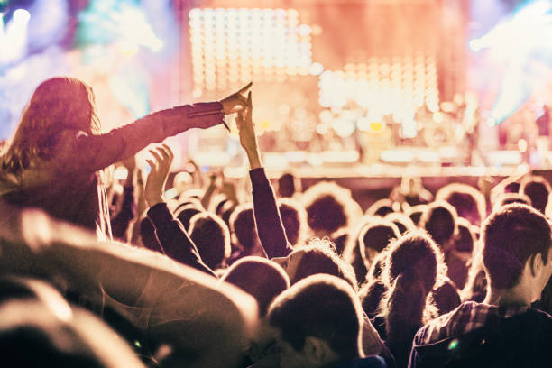 istock cheering crowd at rock concert 1224943872