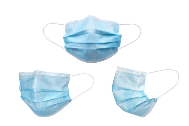 Medical face mask isolated on white background with clipping path Medical face mask isolated on white background with clipping path around the face mask and the ear rope. Concept of COVID-19 or Coronavirus Disease 2019 prevention by wearing face mask. surgical mask stock pictures, royalty-free photos & images