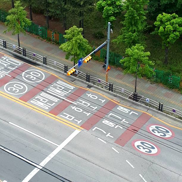 istock a road marked with a child protection zone. 1224949860