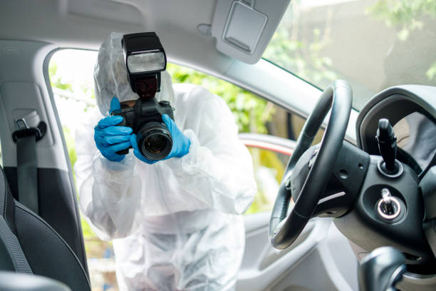 istock Forensic taking photos of crime scene 1224954165