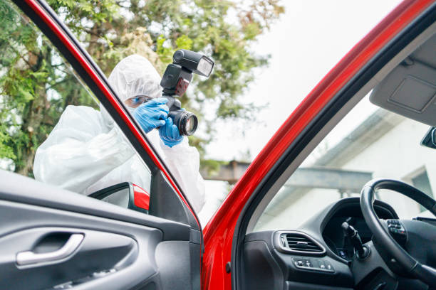 istock Police wearing protective suit when photographing crime scene 1224954175