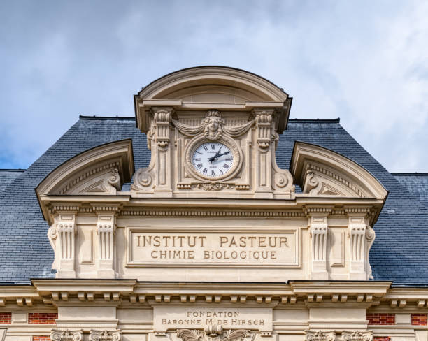 Old building of the Pasteur institute in Paris Paris, France - March 11 2020: Old building facade of the Pasteur institute in Paris pasteur institute stock pictures, royalty-free photos & images