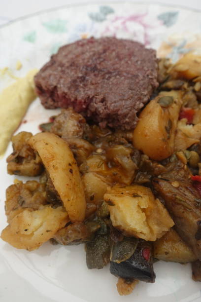 istock Minced steak served with a pan-fried mixed vegetables 1224956944