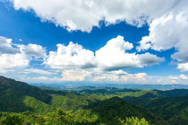 istock Beautiful landscape clouds in blue sky over green mountain forest nature. 1224963145