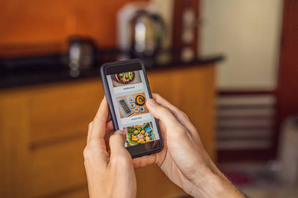 istock man orders food for lunch online using smartphone 1224965651