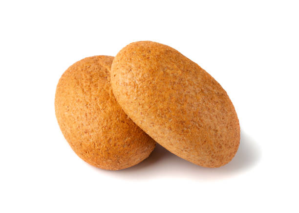 istock Two mini bun breads isolated on white background close up 1224967292