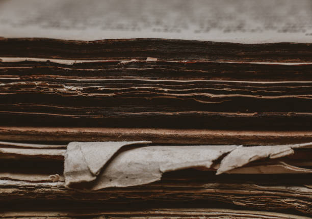 istock shabby old books on the table 1224972315