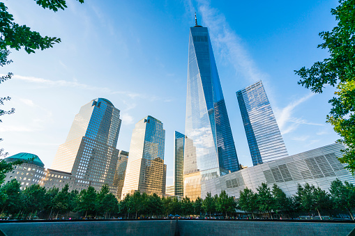 new york ,ny,usa,8-31-17: world trade center  at sunset with reflection in memorial fountain ,new york,usa.