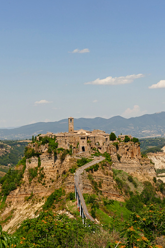 Civita di Bagnoregio is a magical, surreal, fantastic place located on top of a tuff hill that can only be reached by crossing a narrow pedestrian bridge. Nick-named 