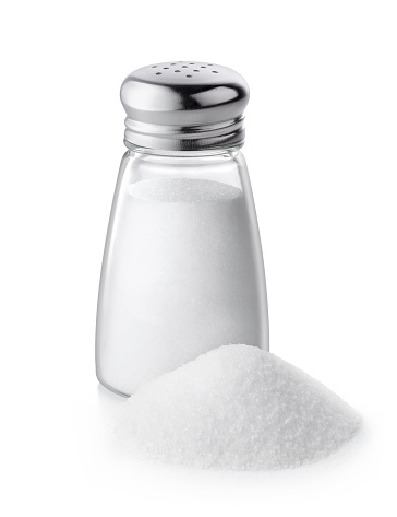 Salt shaker on white background.