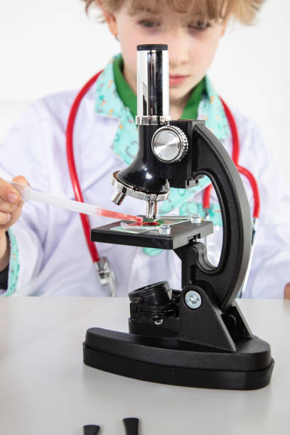 istock young doctor puts a blood sample on a glass slide 1224977847