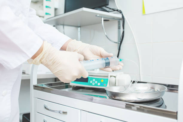 istock Electronic drug perfusion system (syringe pump) in the modern equipped critical care unit. 1224977955