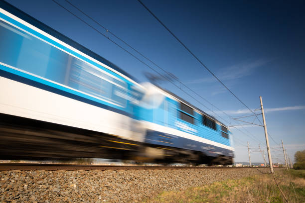 istock Public transport concept, Blurred train passing through the countryside 1224979631