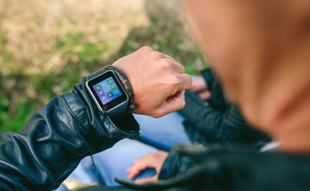 istock Unrecognizable young man looking at his smartwatch 1224979995