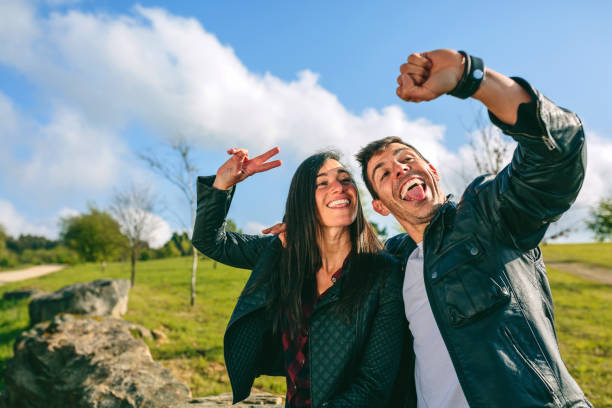 Couple taking a selfie with a smartwatch
