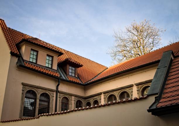 istock Old building with a series of windows and a tiled roof (Prague, Czech Republic, Europe) 1224983002