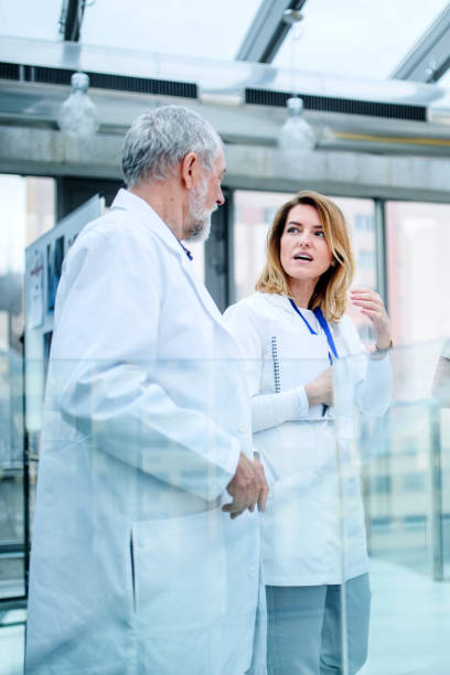 istock Young and old doctors on medical conference, discussing issues. 1224985404