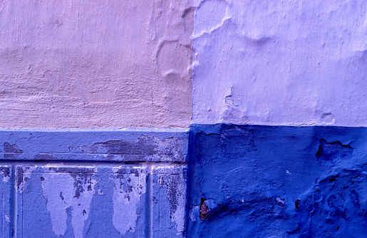 Wall of a house painted with various colors in the city of Ciudadela island of Menorca Balearic Islands Spain