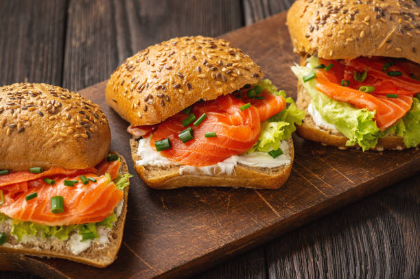 istock Sandwiches with salmon, lettuce and rye bread. 1224986426
