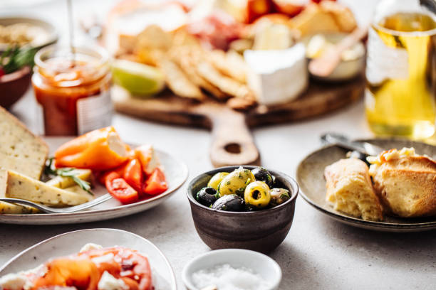 istock Close-up of fresh olive with herb in bowl on tapas table 1224986867
