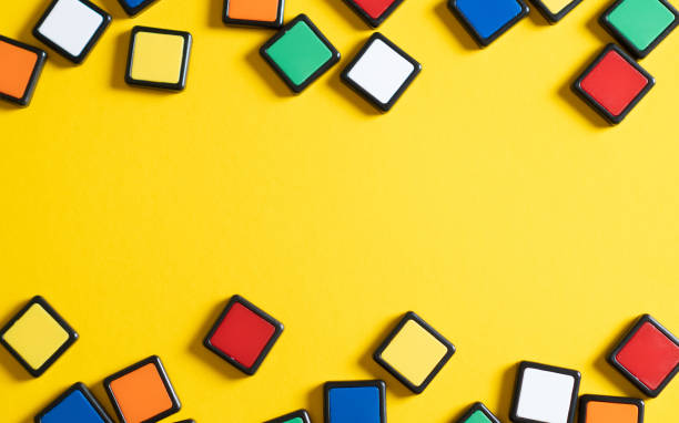 istock Colorful abstract yellow backdrop with frame and space for your text. Yellow background with colorful squares. 1224988844
