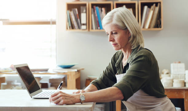 istock Managing her busy online store 1224993424