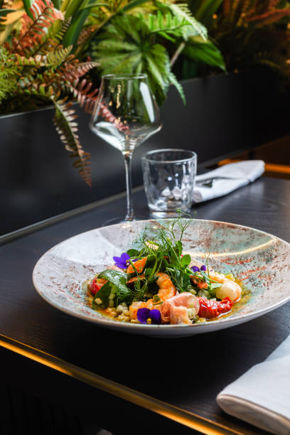 istock Prawn salad view from above in a deep plate against the background 1224994620