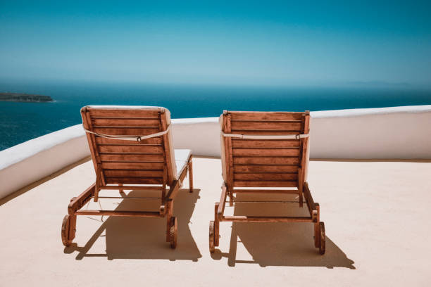 istock Chairs On A Balcony In Santorini, Greece 1224995102