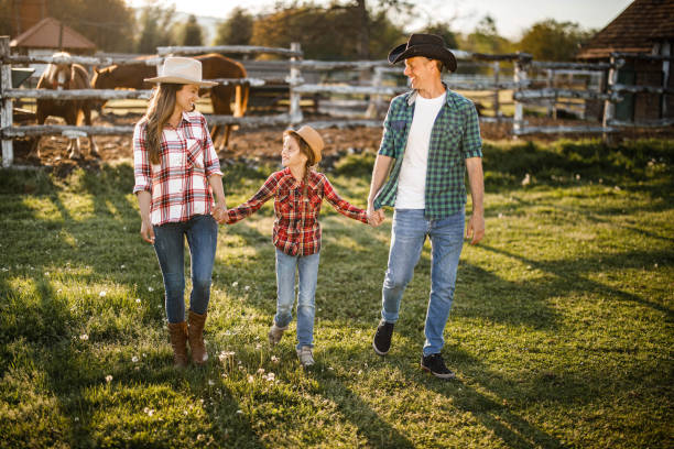 istock Happy family enjoying in their walk on a ranch. 1224996677