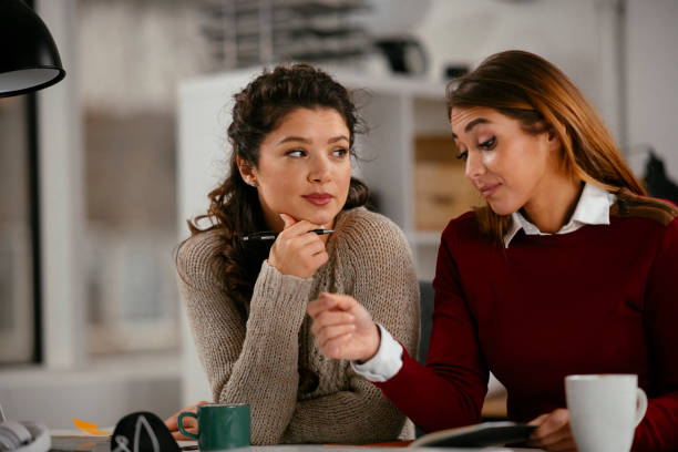 istock Two best friends working together in office. 1225001006