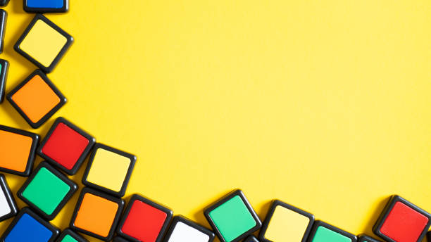 istock Colorful abstract yellow backdrop with frame and space for your text. Yellow background with colorful squares. 1225001150