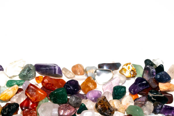 istock Crystal Stone Alternative Lifestyle Healing Chips in Quartz and Amethyst on White Background 1225002231