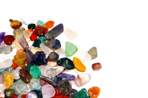 istock Crystal Stone Alternative Lifestyle Healing Chips in Quartz and Amethyst on White Background 1225002272