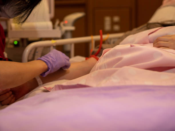 istock A nurse inserting a canula into a patient's arm 1225002315