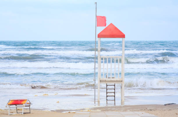 istock Empty beach due to corona lockdown, orphaned beach attendants post, mediteranean coast in italy, symolic picture 1225005183
