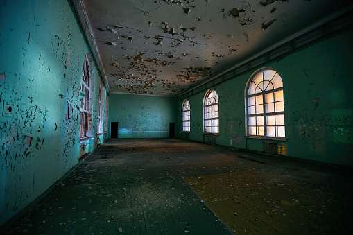 Deteriorated interior of an abandoned asylum from the 1800's in West Virginia