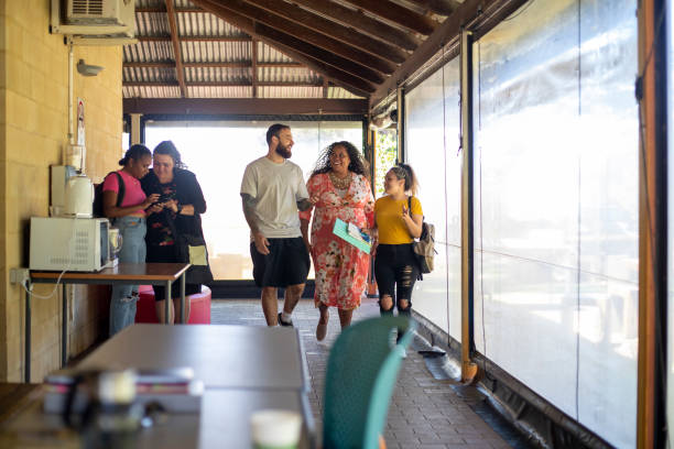 walking through campus - aborigine australia women student imagens e fotografias de stock