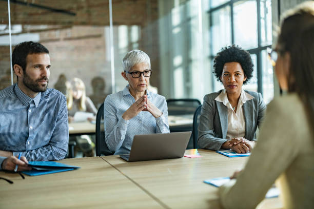 istock Human resource team talking to their candidate on a job interview. 1225018515