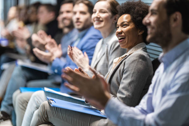 istock Applauding on education event in board room! 1225019132