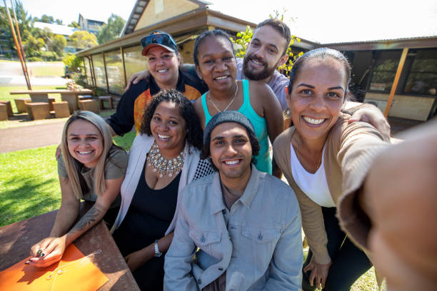 Outdoor Selfie Young aboriginal students and their tutor taking a selfie together outdoors in Australia. western australia photos stock pictures, royalty-free photos & images