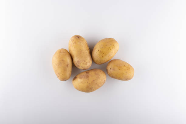 istock young white potatoes close-up on a white background 1225021352