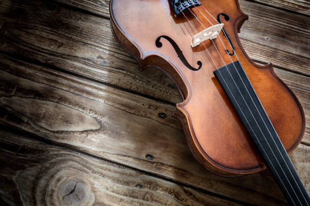 istock Violin on wood background with copy space for music concept 1225022440