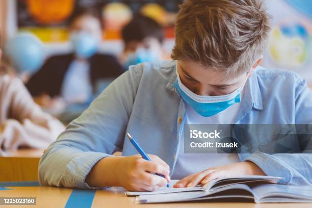 High School Student At School Wearing N95 Face Masks Stock Photo - Download Image Now