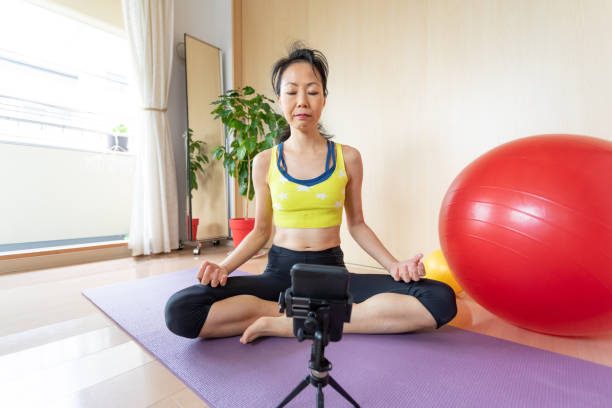 istock Japanese woman training at home 1225023760