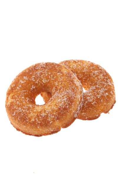 istock Donut with White sprinkles isolated on white background with clipping path 1225025270
