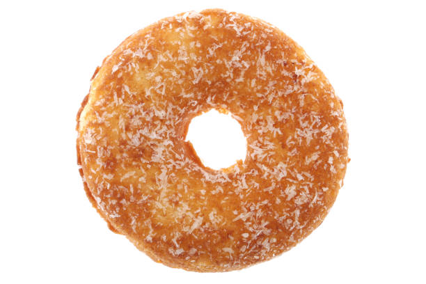 istock Donut with White sprinkles isolated on white background with clipping path 1225025380