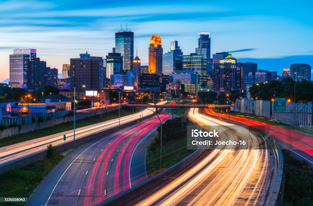 Minneapolis skyline with traffic light at night. Minneapolis Stock Photo